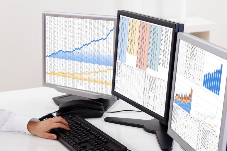 A picture showing a computer screen with a lot of charts and data